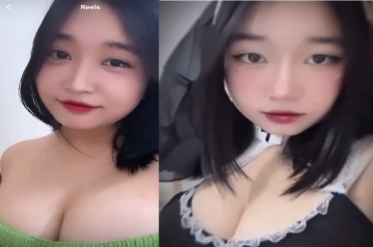 Cô giúp bàn với bộ ngực lớn